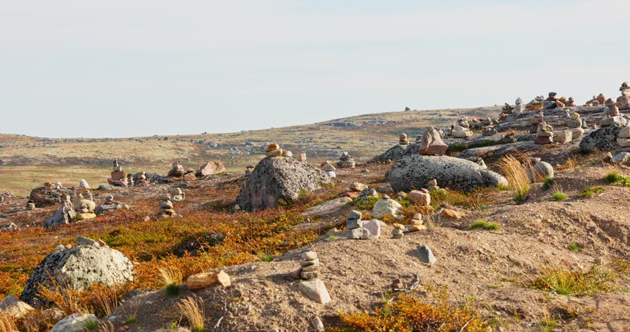 stone mounds, pyramids of stones, colourful arctic carpet of moss, yagel, sunset, Tundra at autumn, tundra near the town of Teriberka in Russia, Murmansk region