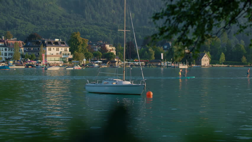Beautiful boats on the shore of Wolfgangsee Austria. Beautiful landscapes of tourist cities in the Alps mountains.