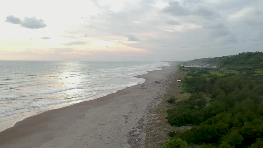 Aerial Coastline Landscape With Waves And Cloudy Sky