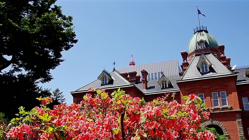 SAPPORO, JAPAN - June. 1 : Former Hokkaido Government Office and azalea garden on June 1, 2013 in Hokkaido, Japan.The building was constructed in 1888 as a base of the Hokkaido administration. 
