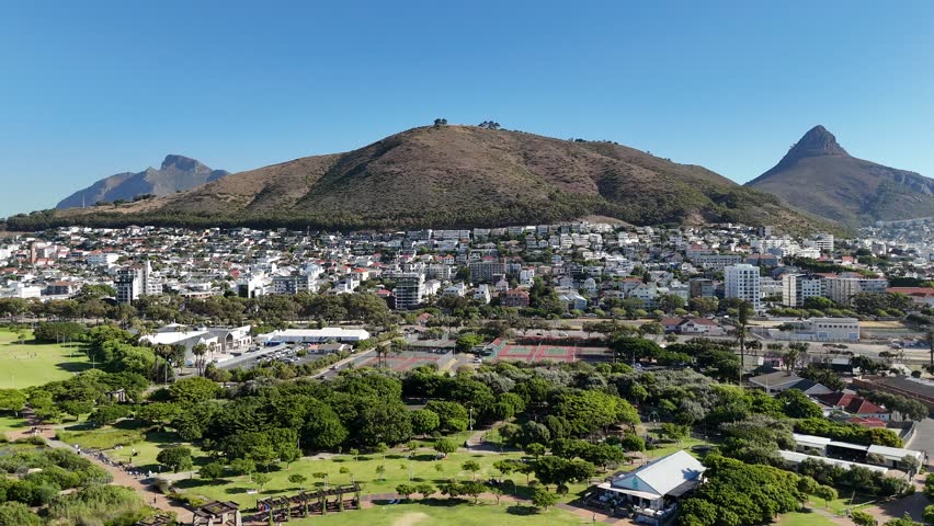 Drone lowers over Green Point Park with view of Devil