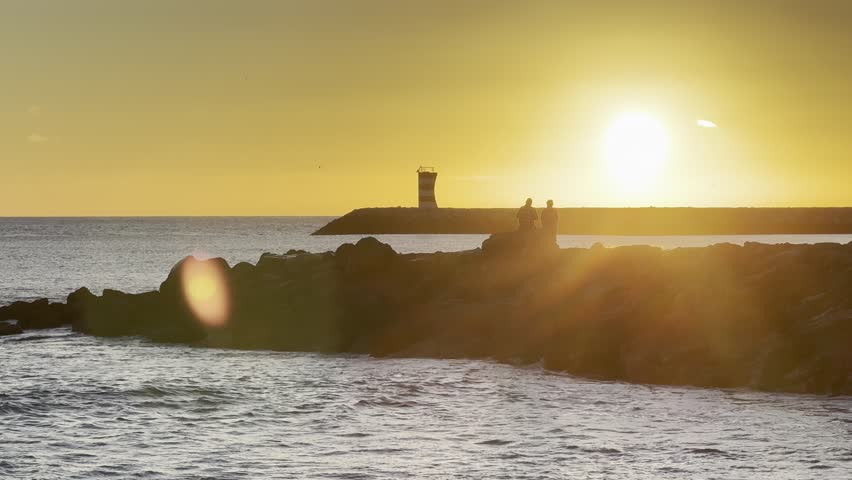 Beautiful sunrise dawn beach with waves, sand, sunrise sky gradually rising to the horizon. Seascape to relax the soul
