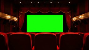 Empty cinema theater with traditional red velvet curtains framing a large green screen ready for production - Powered by Shutterstock - Get 15% off with code: PIKWIZARD15