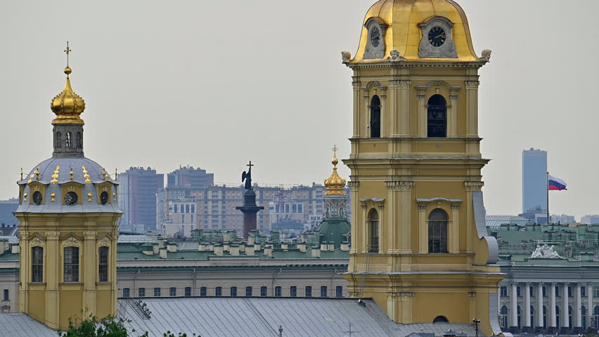 Saint-Petersburg, Russia city center - Alexander column with the angel on top between cupolas of the Peter and Paul fortress