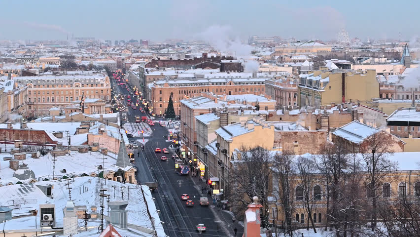 Saint-Petersburg, Russia city center - winter cityscape with snow, rooftop sunrise morning view. Heating utilities pipes steaming
