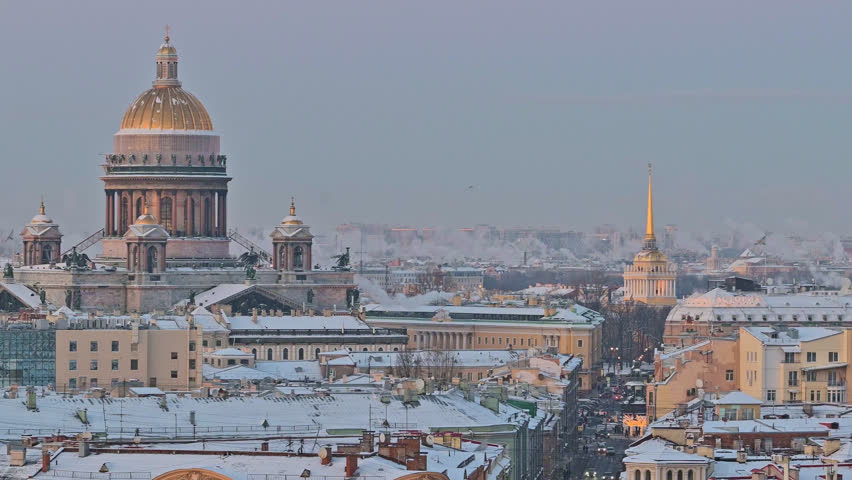 Saint-Petersburg, Russia city center - Isaakievskii Cathedral - russian christian church in winter with snow, rooftop sunrise morning view. Heating utilities pipes steaming