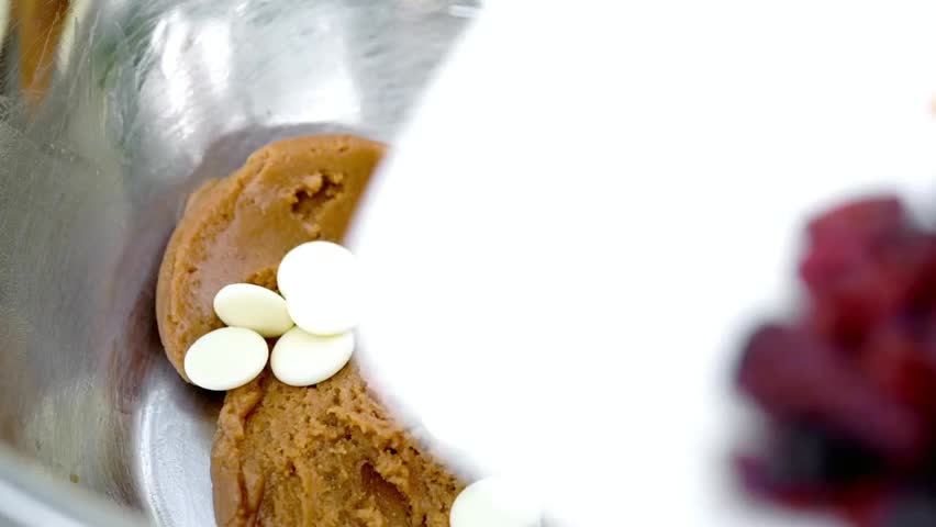 Peanut butter fudge ingredients in a metal bowl ready to be mixed, showcasing rich textures and preparation steps for a homemade sweet treat.
