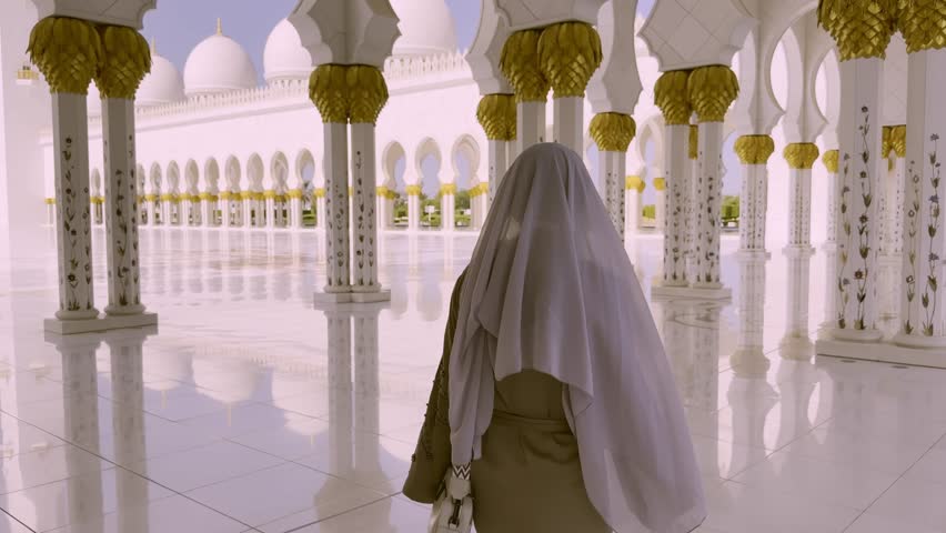 Abu Dhabi, UAE, Sheikh Zayed Grand Mosque. Grand architecture Domes , tourist traveler muslim abaya woman 