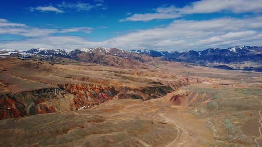 Multicolored geological shades of clay in Altai Republic, Russia. Martian landscape Mars 2 in Chui steppe, Gorny Altay drone view.