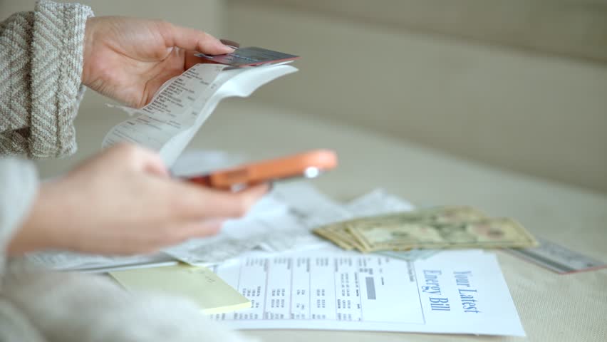 User Paying Monthly Energy Bill At Home, Efficient User Paying Service Costs Using Smartphone And Credit Card, Financial Management, User Paying For Electricity With Energy Bill Document And Cash Money On Desk, Accounting Task, Domestic Expenses, Banking Application, Household Budget, Utility Payment, Economic Crisis, Calculating Expenses, Debt Control