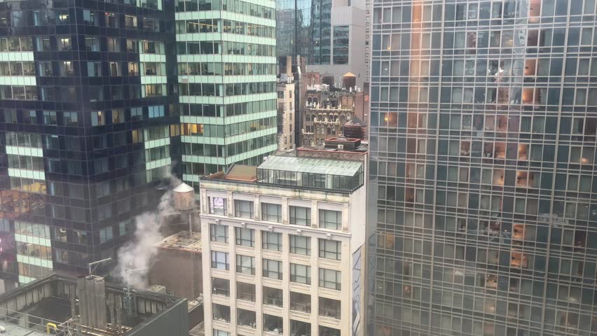 Scene of building windows in the city. Handheld