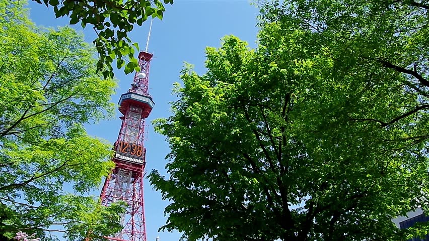 SAPPORO, JAPAN - JUNE. 1 : Sapporo TV Tower and fresh green leaves on June 1,