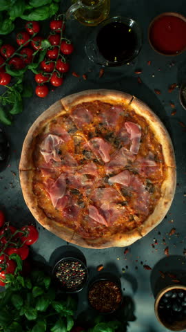 Rotating Fresh Pizza Capricciosa, Endless Loopable Slow Motion Shot.