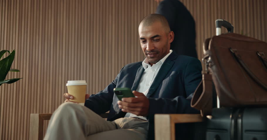 Phone, texting and business man in airport lounge for layover notice, flight schedule and contact. Communication, boarding pass and travel update with person and tech in lobby for waiting room