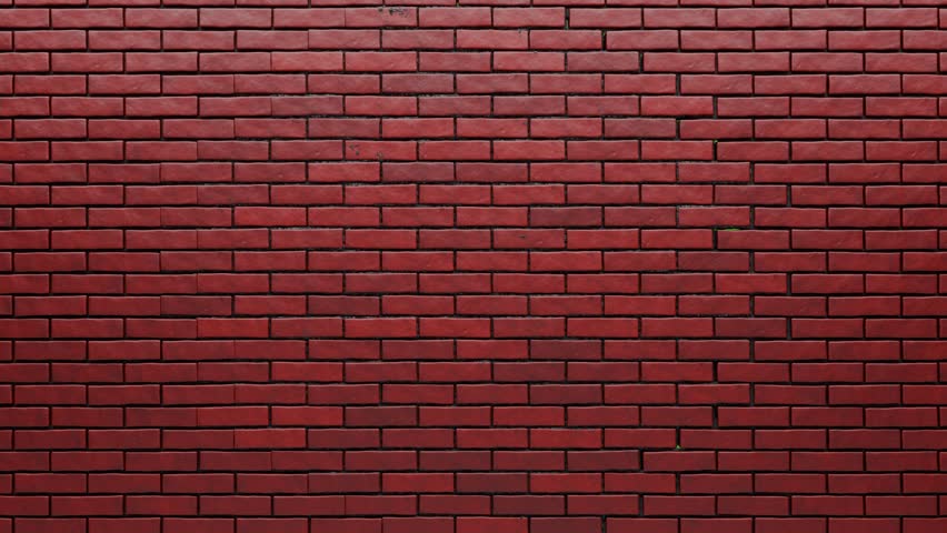 A hole in a red brick wall for your design. An exploding red brick wall. An animation of a brick wall breaking apart.
