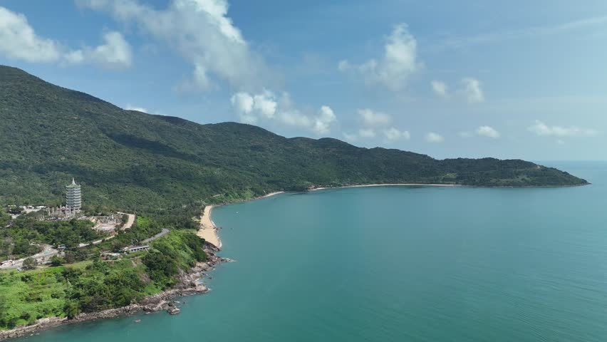 Linh Ung Pagoda, Son Tra Peninsula, Da Nang (Danang), Vietnam – 4K aerial drone footage of Buddhist temple, Lady Buddha statue, coastal mountains and tropical bay