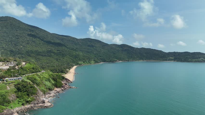 Linh Ung Pagoda, Son Tra Peninsula, Da Nang (Danang), Vietnam – 4K aerial drone footage of Buddhist temple, Lady Buddha statue, coastal mountains and tropical bay