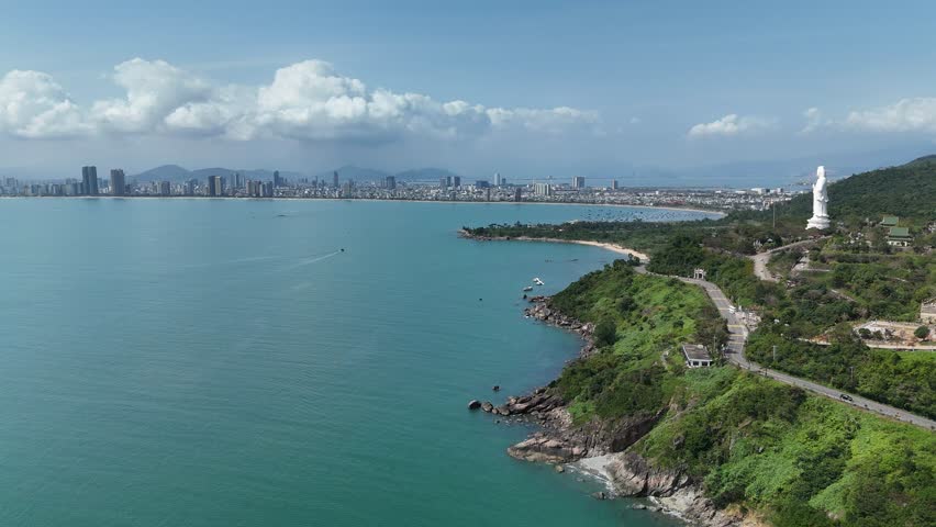 Linh Ung Pagoda, Son Tra Peninsula, Da Nang (Danang), Vietnam – 4K aerial drone footage of Buddhist temple, Lady Buddha statue, coastal mountains and tropical bay