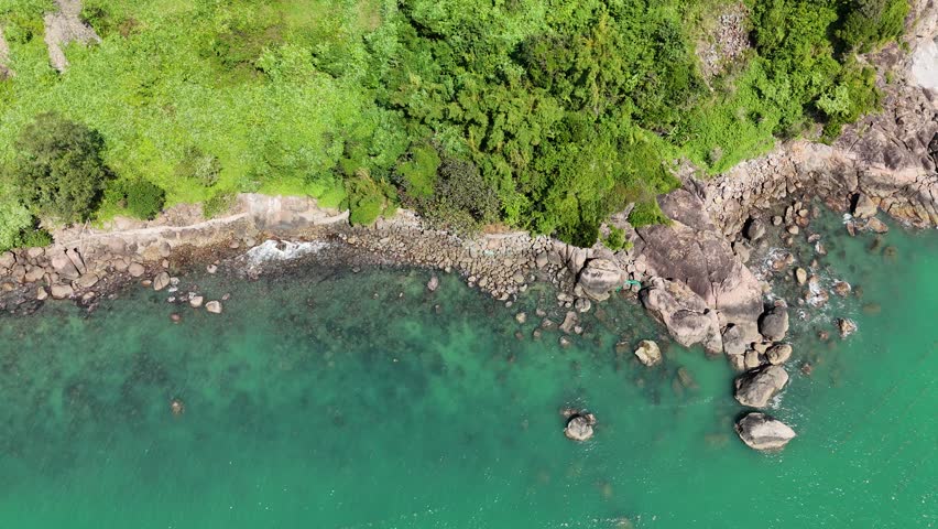 Son Tra Peninsula, Da Nang (Danang), Vietnam – 4K aerial drone footage of coastal mountains, tropical bay, remote rocky beach, lush rain forest