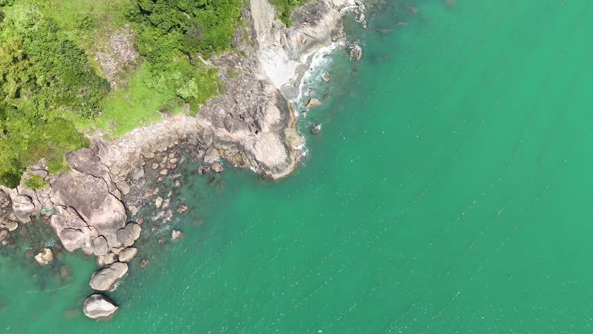 Son Tra Peninsula, Da Nang (Danang), Vietnam – 4K aerial drone footage of coastal mountains, tropical bay, remote rocky beach, lush rain forest