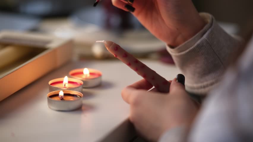 Young Girl Painting A Decorative Candle With Melted Wax And Brush As Hobby For Calm And Relaxation