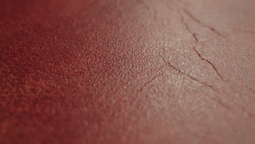 Genuine red leather texture, natural animal skin, luxury vintage cowhide background. Eco friendly leatherette, faux leather. Wallpapere, backdrop, copy space
