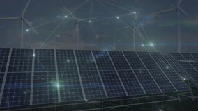 Animation of network of connections over wind turbines and solar panels. Global sustainability, eco solar energy and networks concept digitally generated video. - Powered by Shutterstock - Get 15% off with code: PIKWIZARD15