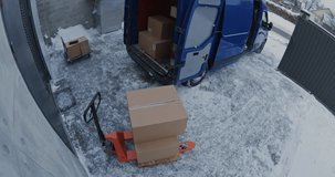 Male Porter Falls Hard on Ice While Unloading Parcels From Van and Cannot Stand. Anxious Woman Calls Ambulance For Injured Colleague. CCTV Shows Severe Winter Accident During Delivery Process. - Powered by Shutterstock - Get 15% off with code: PIKWIZARD15