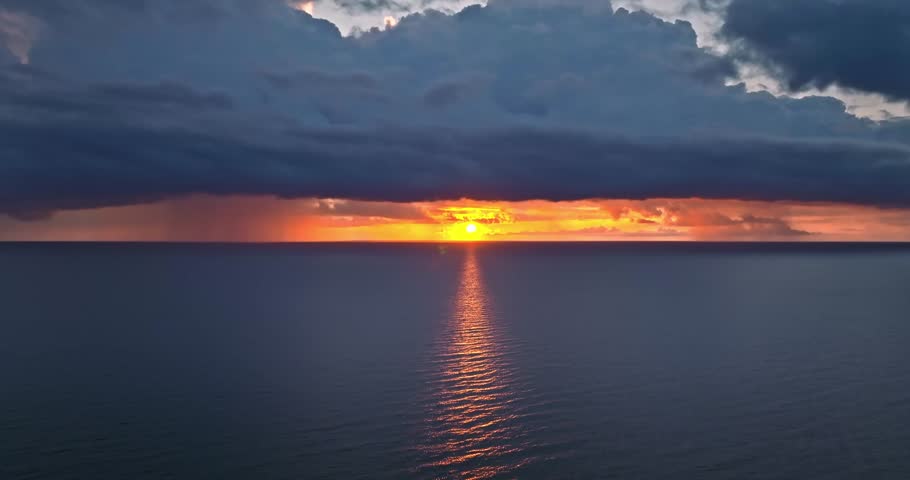 Wonderful sunbeams over sea at sunset in Poland. Vacation at the seaside.