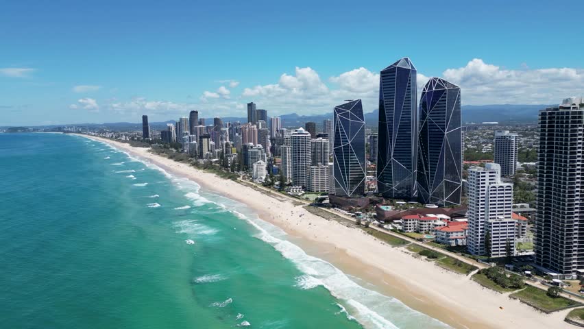 Fly over 4k drone video of the beachfront and surfers paradise skyline, Gold Coast, Australia. Queensland