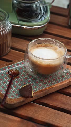 Dipping Chocolate Cookie into Cappuccino, Cozy Coffee Break Scene