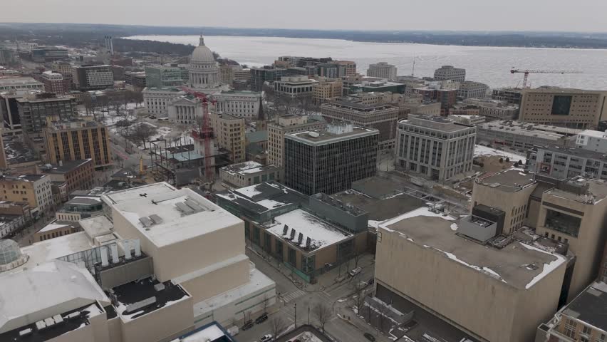 Drone footage of academic buildings at the University of Wisconsin–Madison covered in fresh snowfall in Madison.