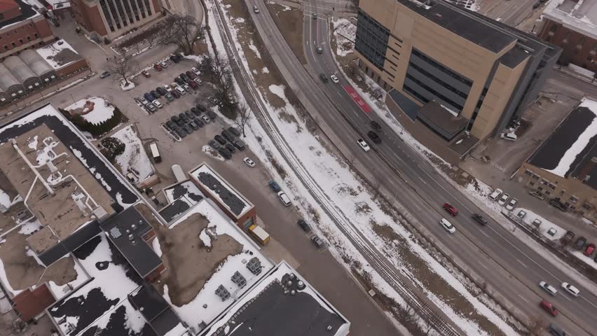 Clean minimalist aerial over frozen surface near Madison creating abstract white seasonal background visuals.