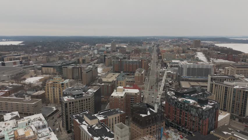 Aerial footage of a dock surrounded by ice on Lake Mendota in Madison during deep cold conditions.