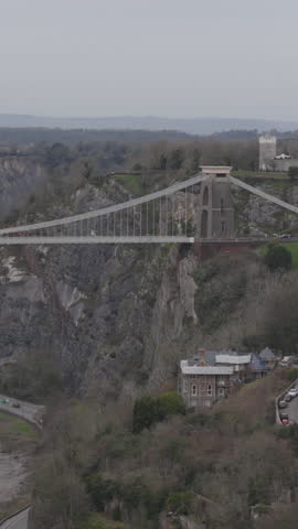 Vertical aerial view of the Clifton Suspension Bridge in Bristol, England, United Kingdom. Beautiful bridge designed by Isambard Kingdom Brunel.