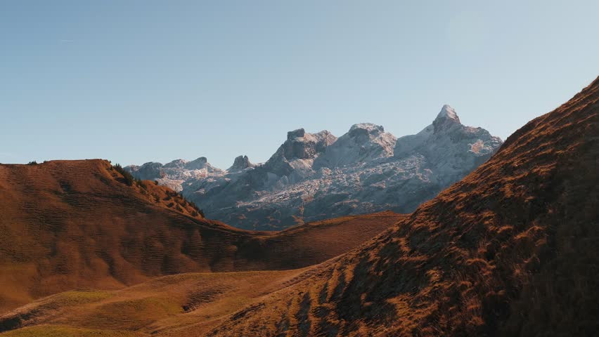 Switzerland alps mountains in Schwyzer Alps area. Picturesque stunning landscape of rocky mountain peaks and summits