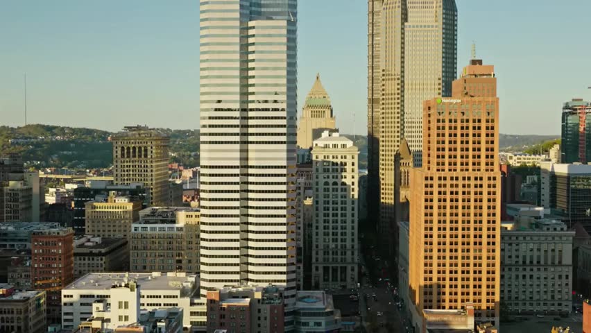 Downtown Cleveland skyline featuring a mix of modern and historic architecture, highlighting urban development and cityscape.