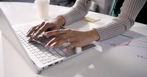 Upon placing phone diverse coworkers typing on laptop marking data and sorting notes at office. Collaboration, teamwork, data analysis, brainstorming, professional, modern, productivity - Powered by Shutterstock - Get 15% off with code: PIKWIZARD15