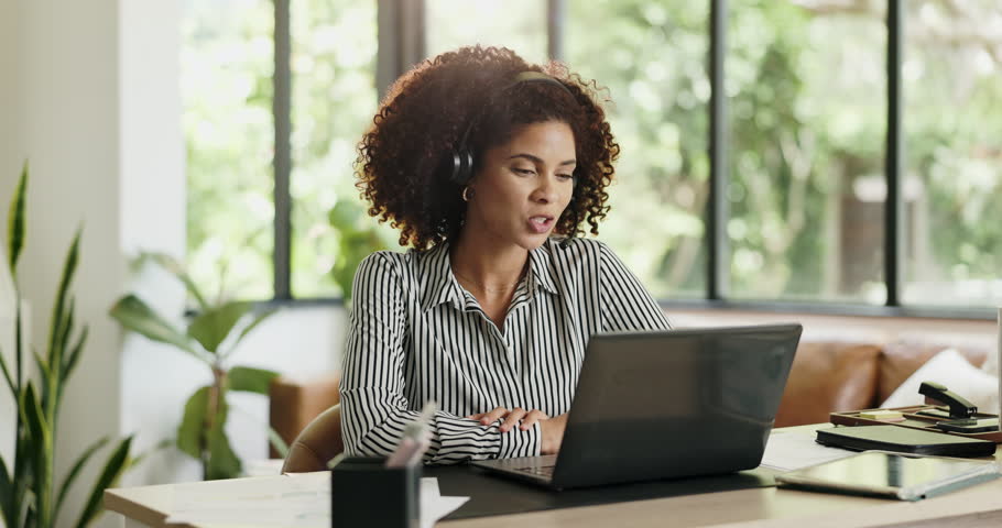 Woman, laptop and talk with headset for remote work from home, review and documents for online meeting. Person, computer and virtual assistant with charts, mic or feedback with freelance job at house