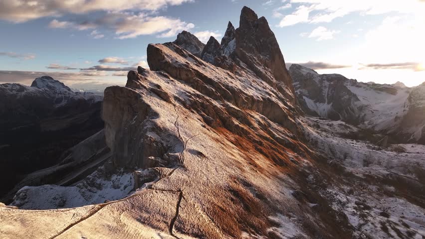 Bright sunlight is over horizon. Seceda mountain, aerial view of majestic nature, beautiful touristic place.