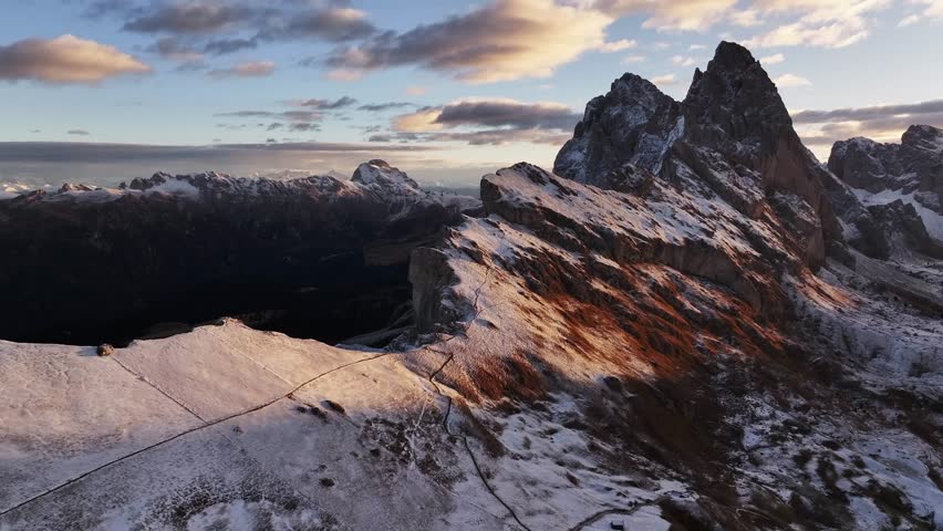Bright sunlight is over horizon. Seceda mountain, aerial view of majestic nature, beautiful touristic place.