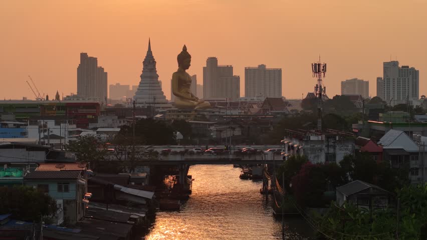 Big golden buddha statue riverside temple pagoda local village city background Bangkok Thailand