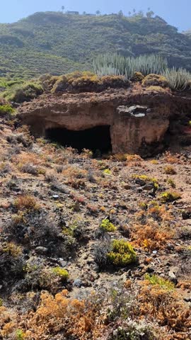 Historic man-made caves carved in volcanic tuff by local farmers, Costa El Sauzal, Tenerife, Canary Islands, Spain