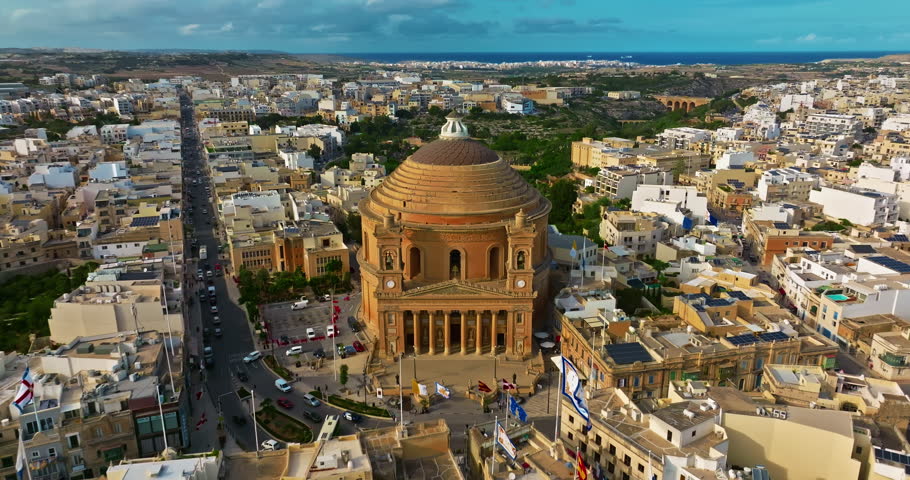 Aerial view of Mosta Church, famous remarkable wartime miracle, architectural landmarks, Malta 