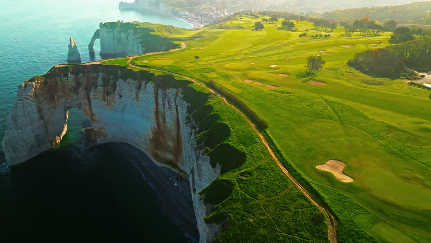 Aerial view of picturesque coastal limestone cliffs. Etretat, France