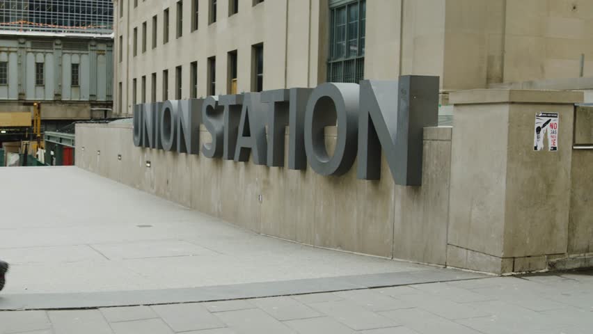 Exterior view of Union Station signage in downtown Toronto, Ontario, Canada. Major transportation hub and historic railway station serving commuters, VIA Rail, GO Transit, and airport connections.
