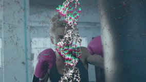 Animation of dna strand and shapes over caucasian female boxer punching. Global sport and digital interface concept digitally generated video. - Powered by Shutterstock - Get 15% off with code: PIKWIZARD15
