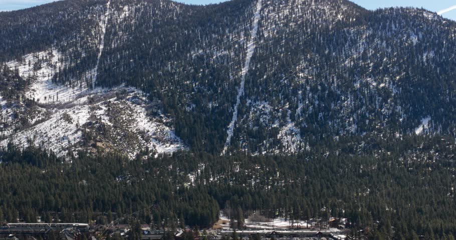 South Lake Tahoe, CA, USA - 02-15-2026  Aerial video of South Lake Tahoe, California and Stateline, Nevada on a winter afternoon.  
