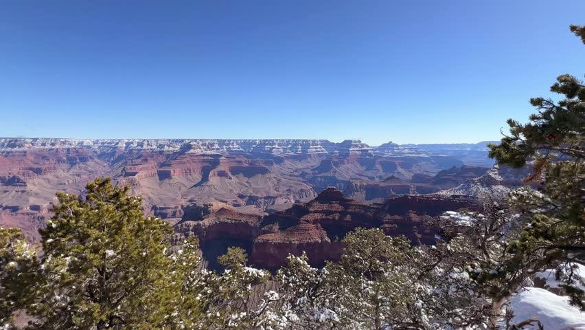 Experience the Stunningly Beautiful Views of the Grand Canyon in a Winter Wonderland Landscape