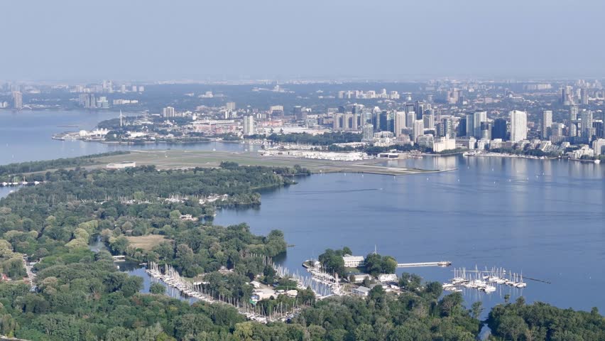 Toronto skyline with CN Tower, waterfront and Toronto Islands at Lake Ontario, aerial cityscape panorama, Canada. g.